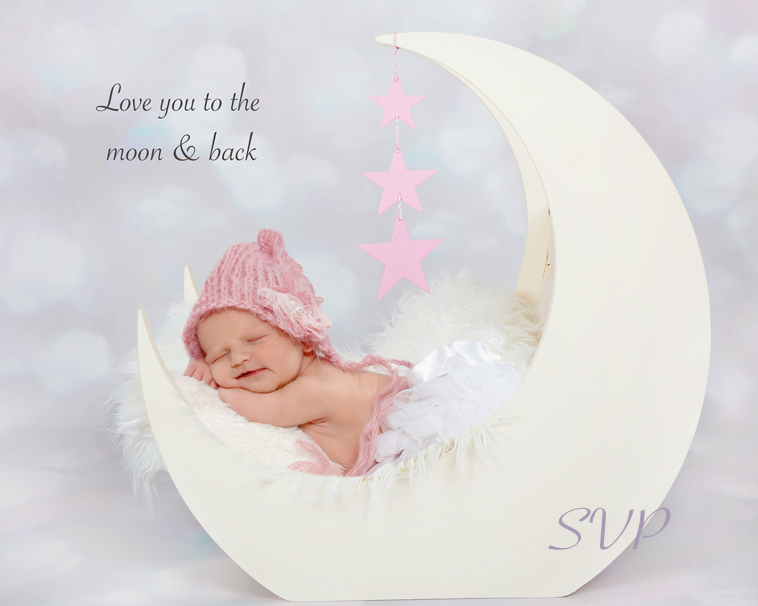 Newborn baby girl at 7 days young in our Moon Crib 